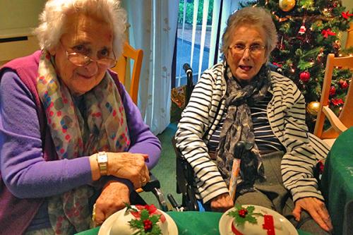 residents with Christmas cakes